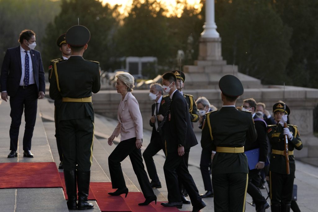 epa10561393 European Commission President Ursula von der Leyen (C) arrives for a meeting with the Chinese and French presidents at the Great Hall of the People in Beijing, China, 06 April 2023. EPA-EFE/Ng Han Guan / POOL