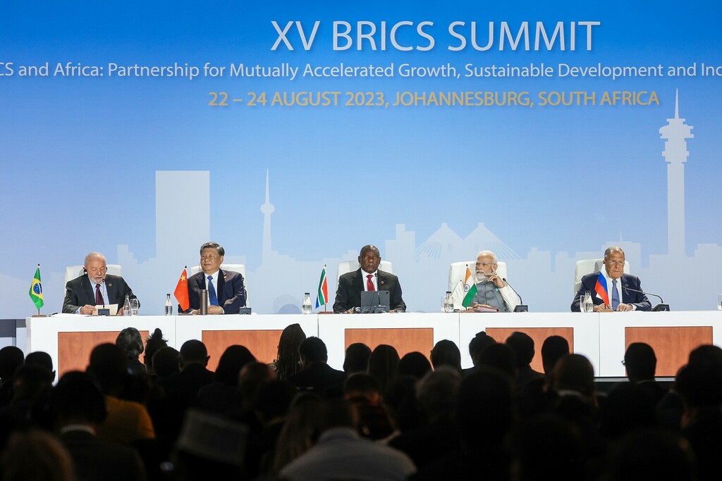 In this handout photo released by the Russian Foreign Ministry, from left, Brazilian President Luiz Inacio Lula da Silva, Chinese President Xi Jinping, South African President Cyril Ramaphosa, Indian Prime Minister Narendra Modi and Russian Foreign Minister Sergey Lavrov attend a news conference during the 15th BRICS Summit at the Sandton Convention Centre in Johannesburg, South Africa. Editorial use only, no archive, no commercial use. Russian Foreign Ministry Johannesburg South Africa