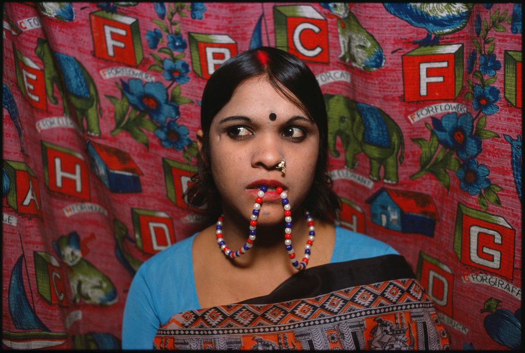 Rekha with beads in her mouth, Falkland Road, Mumbai, India, 1978