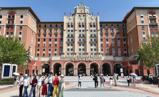 September 7, 2021, Beijing, China: Tourists pose for pictures in front of Beijing Universal Studios..Universal Beijing R