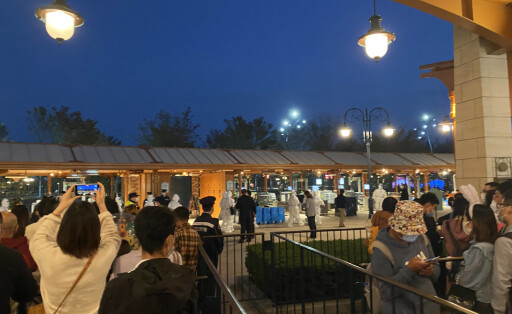 SHANGHAI, CHINA - OCTOBER 31: Tourists wait to receive COVID-19 nucleic acid test at Shanghai Disney Resort on October 3