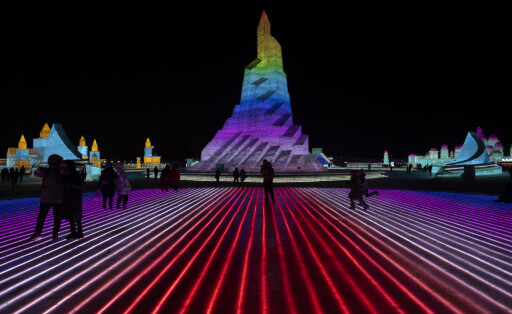220102 -- HARBIN, Jan. 2, 2022 -- Tourists visit the Harbin Ice-Snow World in Harbin, northeast China s Heilongjiang Province on Jan. 2, 2022. Harbin, famous for its ice and snow tourism, attracts tourists during the winter time. CHINA-HEILONGJIANG-HARBIN-ICE-SNOW-TOURISM CN ZhangxTao PUBLICATIONxNOTxINxCHN