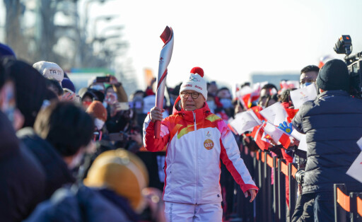 220202 -- BEIJING, Feb. 2, 2022 -- Torch bearer Luo Zhihuan runs with the torch during the Beijing 2022 Olympic Torch Relay at the Olympic Forest Park in Beijing, capital of China, Feb. 2, 2022. BEIJING 2022 CHINA-BEIJING-OLYMPIC TORCH RELAY CN ChenxYehua PUBLICATIONxNOTxINxCHN