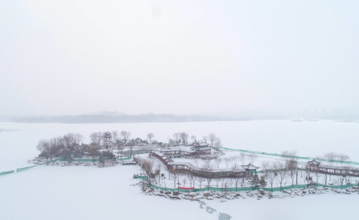 220207 -- YINCHUAN, Feb. 7, 2022 -- Aerial photo taken on Feb. 7, 2022 shows the snow scenery in Yinchuan, capital of northwest China s Ningxia Hui Autonomous Region. CHINA-NINGXIA-YINCHUAN-SNOW CN WangxPeng PUBLICATIONxNOTxINxCHN