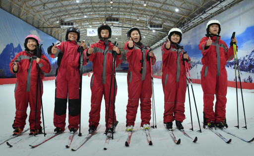 211122 -- LUANCHUAN, Nov. 22, 2021 -- Cross-country skiing team members of Luanchuan County Special Education School Sun Jiaxin 1st R, Pei Fuxin2nd L, Wang Siyu1st L, Li Yinuo 2nd R and Liu Jiaohan 3rd R pose at the Funiu Mountains Ski Resort in Luanchuan County, central China s Henan Province, Nov. 18, 2021. Since 2019, Luanchuan County Special Education School began winter sports training among children on the campus by building cross-country skiing training slides, floor curling gyms and other facilities. Luanchuan County is located beside Funiu mountains, which gives these children chances to go skiing in the ski resorts. Despite physical obstacles affect their understanding of guidance and training efficiency, these children practice hard and very much enjoy themselves. In recent years, more than 30 children stepped out of the mountains to compete in several national special Winter games, Winterspiele,Spiele, Summer games and won about 60 medals. Five intellectually disabled children, Sun Jiaxin, Pei Fuxin, Wang Siyu, Li Yinuo, and Liu Jiaohan were pre-selected into the national team, Nationalteam of cross-country skiing for Special Olympics Winter Games. They are now preparing for the 12th Special Olympics World Winter Games. SPCHINA-HENAN-LUANCHUAN-SPECIAL EDUCATION SCHOOL-CROSS-COUNTRY SKIING-TRAINING LixAn PUBLICATIONxNOTxINxCHN