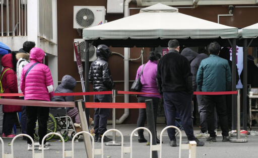 China s faltering zero-COVID policy Residents line up for fever outpatient service at a hospital in central Beijing on Dec. 12, 2022, as China faces new challenges after relaxing zero-COVID policy. PUBLICATIONxINxGERxSUIxAUTxHUNxONLY A14AA0001374753P
