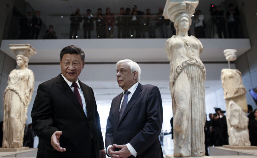 epa07990695 Chinese President Xi Jinping (R) speaks to Greek President Prokopis Pavlopoulos (R) during a visit to the Acropolis Museum in Athens, Greece, 12 November 2019. Chinese President Xi Jinping concluded his two-day official visit to Greece. 'Not only do I agree that the Parthenon Sculptures should be returned but you will have our support, because we also have many of our own artifacts from Chinese civilisation that are outside the country and that we are trying to bring back home,' stated visiting Chinese President Xi Jinping to President of the Hellenic Republic Prokopios Pavlopoulos, during their visit to the Acropolis Museum. EPA-EFE/KOSTAS TSIRONIS