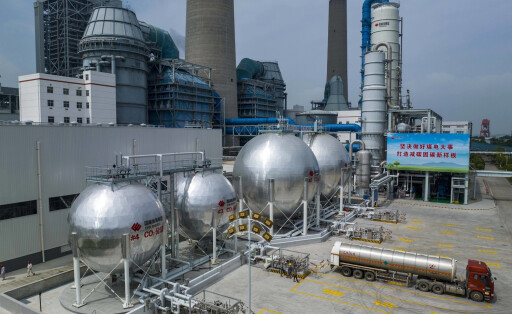 230602 -- TAIZHOU, June 2, 2023 -- This aerial photo taken on June 1, 2023 shows workers loading carbon dioxide at Taizhou coal-fired power plant of China Energy Investment Corporation China Energy in Taizhou, east China s Jiangsu Province. China Energy on Friday announced that it has put Asia s largest carbon capture, utilization and storage CCUS facility for the coal-fired power generation sector into operation in east China s Jiangsu Province. TO GO WITH China launches Asia s largest carbon capture project for coal-fired power sector Photo by /Xinhua CHINA-JIANGSU-CARBON CAPTURE PROJECT CN TangxDehong PUBLICATIONxNOTxINxCHN