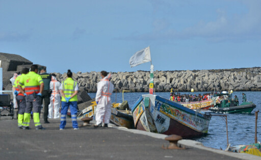Two Canoes With 327 Migrants Arrive At El Hierro Island - Spain A Guardia Civil boat transfers one of the cayucos that h