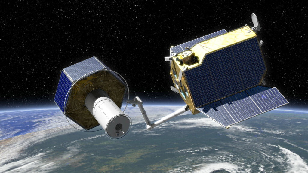 Künstlerische Darstellung zeigt das Greifen des Client (l.) durch den Servicer-Satelliten und illustriert das deutsche DEOS-Projekt, das auf der Luft- und Raumfahrtmesse ILA vorgestellt wird. Das Kürzel steht für Deutsche Orbitale Servicing Mission und umfasst Technologien zur Verlängerung der Lebensdauer von Satelliten.