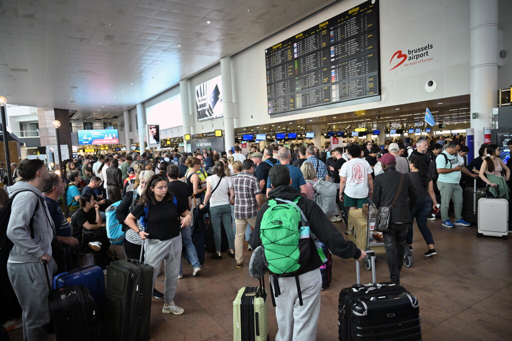 BRUSSELS, BELGIUM - SEPTEMBER 20: Passengers continue to wait at the Brussels Airport as European airports are experiencing disruptions due to a cyberattack on the check-in and boarding system in Brussels, Belgium on September 20, 2025. Heathrow, Brussels, and Berlin airports affected by cyberattack, forcing a switch to manual operations and resulting in cancellations, long delays. A cyberattack on a third-party system provider has caused widespread flight disruptions at several major European airports, including LondonÄôs Heathrow plus Brussels and Berlin, authorities said Saturday. Brussels Airport confirmed at least four flight cancellations on Saturday morning, including departures to Rwanda and Amsterdam, following the Friday night attack, which knocked out automated check-in and boarding systems. Dursun Aydemir / Anadolu