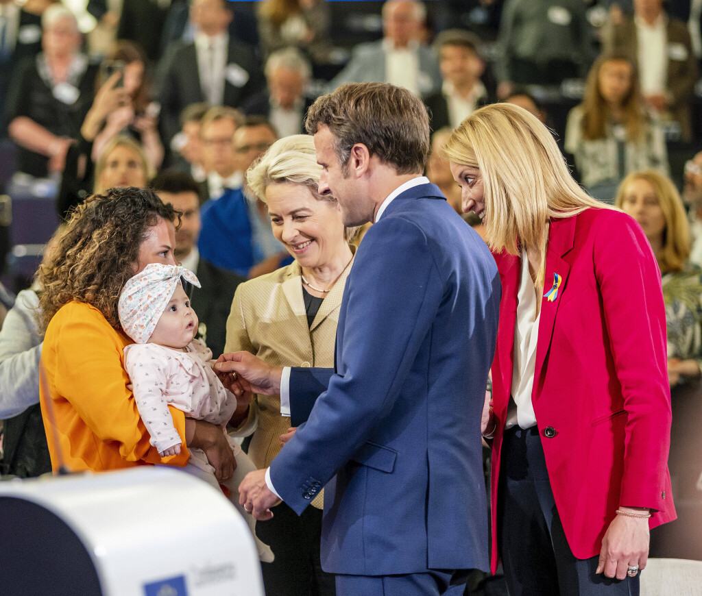 French President Emmanuel Macron and President of the European Commission Ursula Von der Leyen and European Parliament Chairman Roberta Metsola (right) great with a mother and her baby, that was born on May 9th 2021 at the official start of the Conference on the Future of Europe, at the end of the closing ceremony of the conference in European Parliament in Strasbourg, France on May 9, 2022.