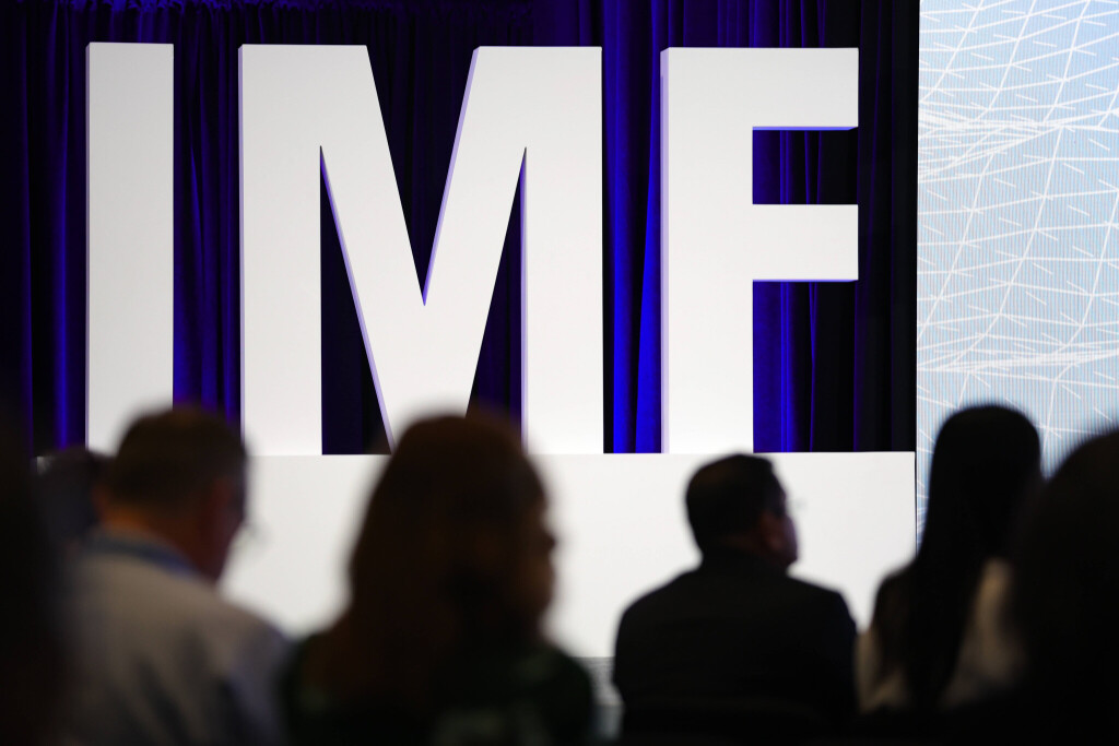People attend a press conference at the 2025 Spring Meetings of the World Bank Group (WBG) and the International Monetary Fund (IMF) in Washington, D.C.