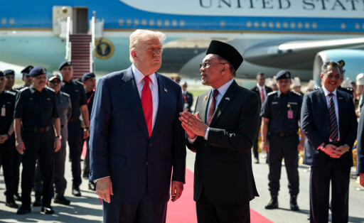 U.S. President Donald Trump is greeted by Malaysian Prime Minister Anwar Ibrahim upon arrival at Kuala Lumpur International Airport in Kuala Lumpur, Malaysia, on Sunday, October 26, 2025, where he will attend the 47th Association of Southeast Asian Nations (ASEAN) summit.