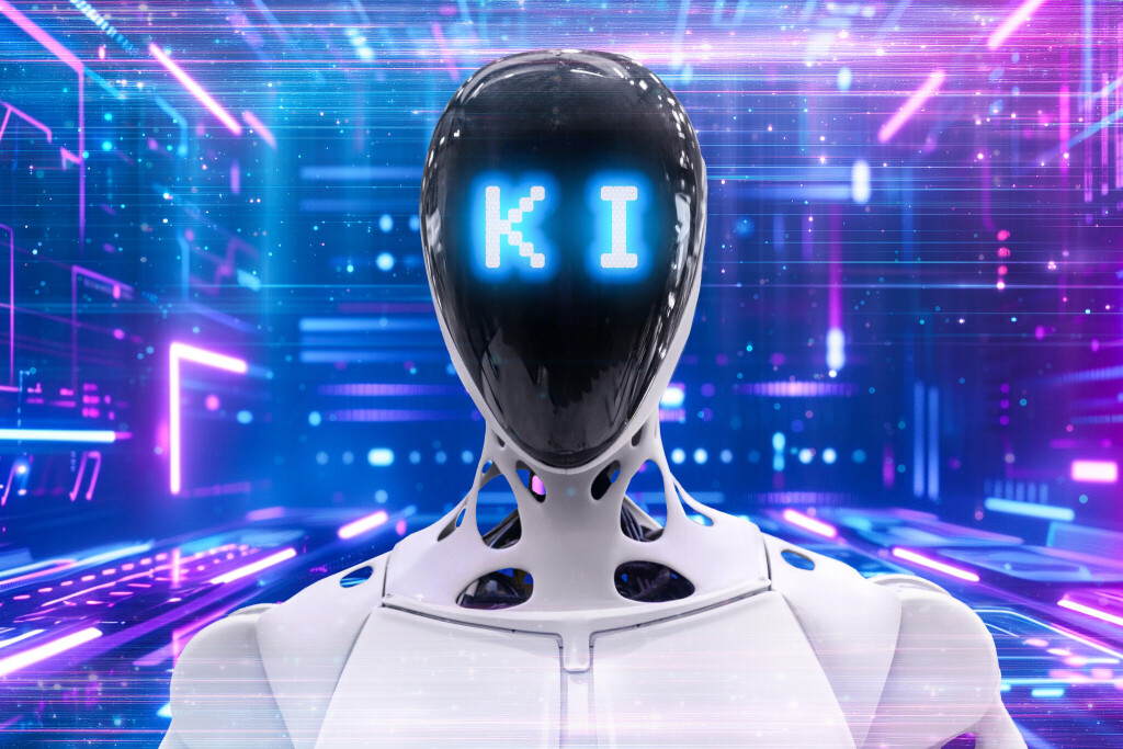 FOTOMONTAGE, Ein humanoider Roboter mit leuchtendem Schriftzug KI im Gesicht zeigt den technologischen Fortschritt und die Rolle künstlicher Intelligenz in einer digitalisierten Zukunft.