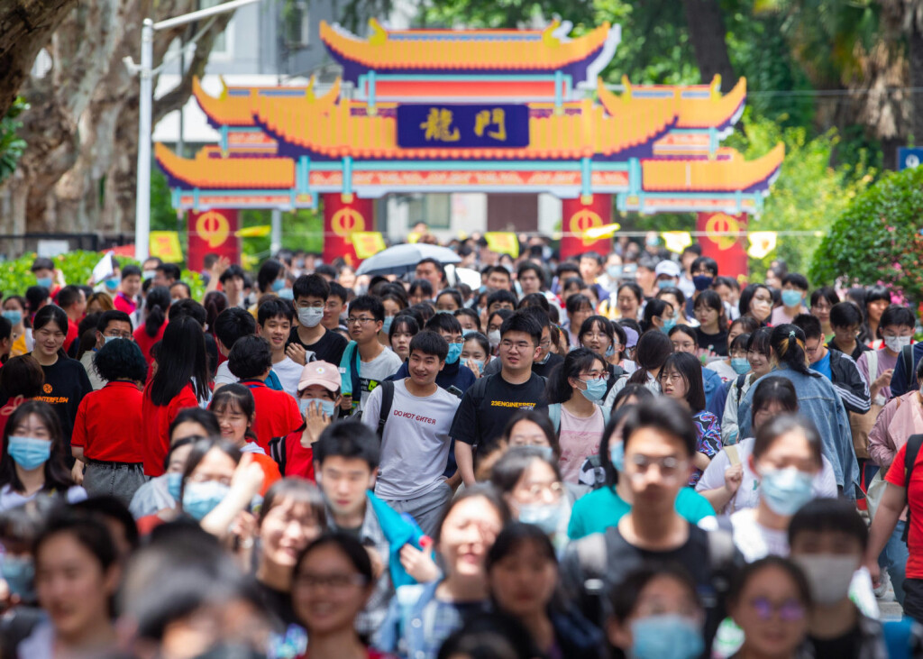 NANJING, CHINA - JUNE 07: Students walk out of the exam veune after finishing the first subject of the 2021 National Col