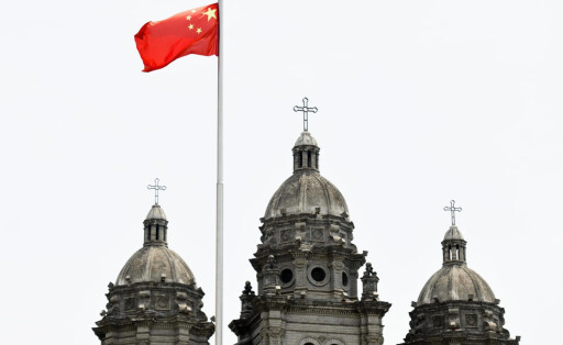 Chinese government-approved Catholic church A Chinese flag is hoisted at a Catholic church officially approved by the Chinese government in Beijing on June 15, 2021. PUBLICATIONxINxGERxSUIxAUTxHUNxONLY