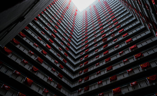 June 26, 2022, Hong Kong, China: Hundreds of flags of the People s Republic of China and Hong Kong SAR decorate a public housing building. On July 1st, 2022 the city will mark the 25th Anniversary of the establishment of the Hong Kong Special Administrative Region HKSAR of the People s Republic of China. Hong Kong China - ZUMAt141 20220626_zap_t141_004 Copyright: xKeithxTsujix
