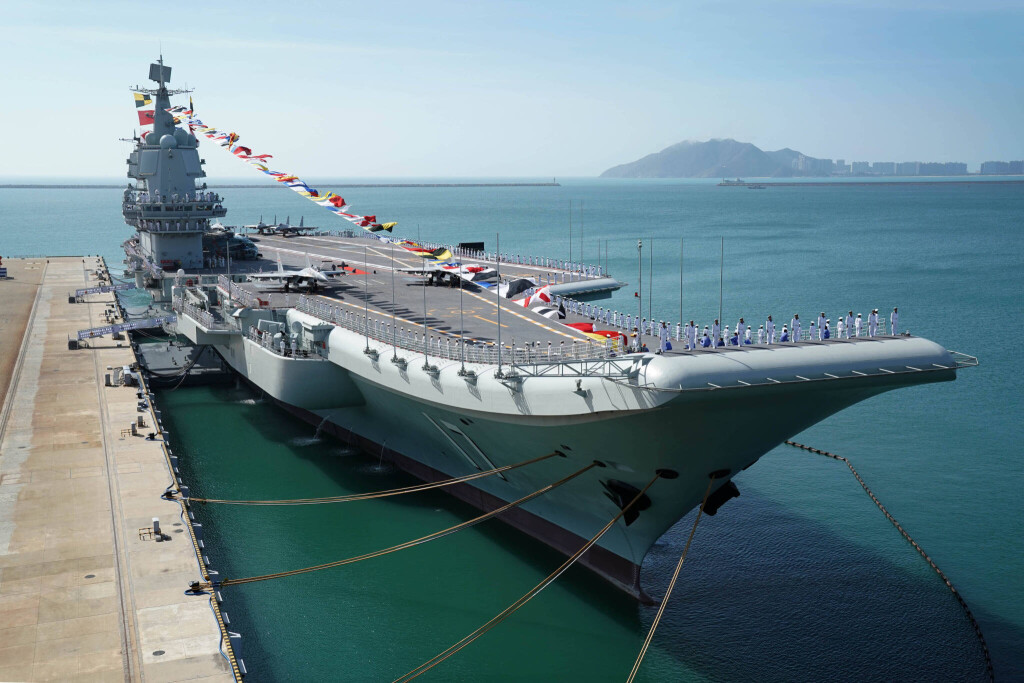 191228 -- BEIJING, Dec. 28, 2019 -- Photo taken on Dec. 17, 2019 shows the Shandong aircraft carrier at a naval port in Sanya, south China s Hainan Province. China s first domestically built aircraft carrier, the Shandong, was delivered to the People s Liberation Army PLA Navy and placed in active service on Dec. 17 at a naval port in Sanya. The new aircraft carrier, named after Shandong Province in east China, was given the hull number 17. XINHUA PHOTOS OF THE DAY LixGang PUBLICATIONxNOTxINxCHN