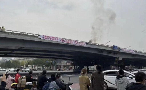 Peking: Protest-Banner