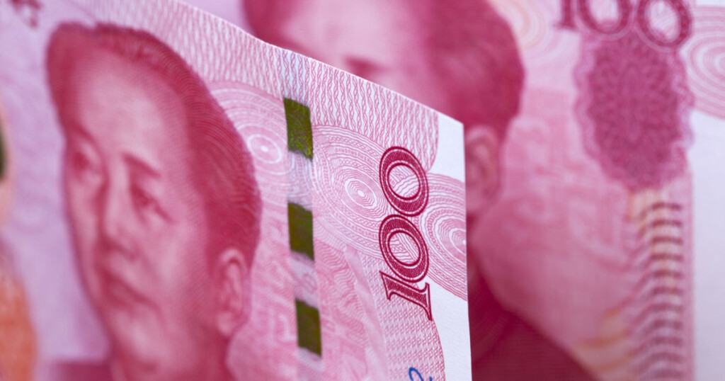 Chinese money - 100 Yuan - business background
