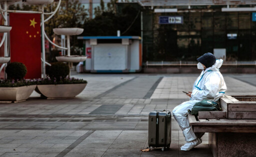 epa10375443 A man wearing protective gear sits at the Shanghai Railway Station, in Shanghai, China, 21 December 2022. According to the National Health Commission report on 21 December, China reported 3,049 locally transmitted Covid-19 cases. After easing domestic Covid-19 restrictions, Guangzhou and Chengdu made further adjustments to international passenger's quarantine policy. On 20 December, Chengdu implemented a 2+3 quarantine policy where passengers must stay 2 days in centralised quarantine and 3 days at home. EPA-EFE/ALEX PLAVEVSKI