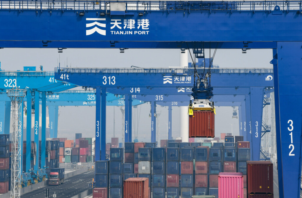 220409 -- TIANJIN, April 9, 2022 -- A container is loaded at the Beijiang Port Area of Tianjin Port in north China s Tianjin, April 9, 2022. North China s Tianjin Port handled approximately 4.63 million 20-foot equivalent units TEUs of containers in the first three months of 2022, up 3.5 percent year on year. The throughput figure marks a record high for the port compared to the same period in previous years, according to the port s operator. Despite negative impacts brought by the COVID-19 resurgence, the port has rolled out a series of prevention and control measures to safeguard smooth operation. CHINA-TIANJIN PORT-THROUGHPUT-NEW RECORD CN SunxFanyue PUBLICATIONxNOTxINxCHN