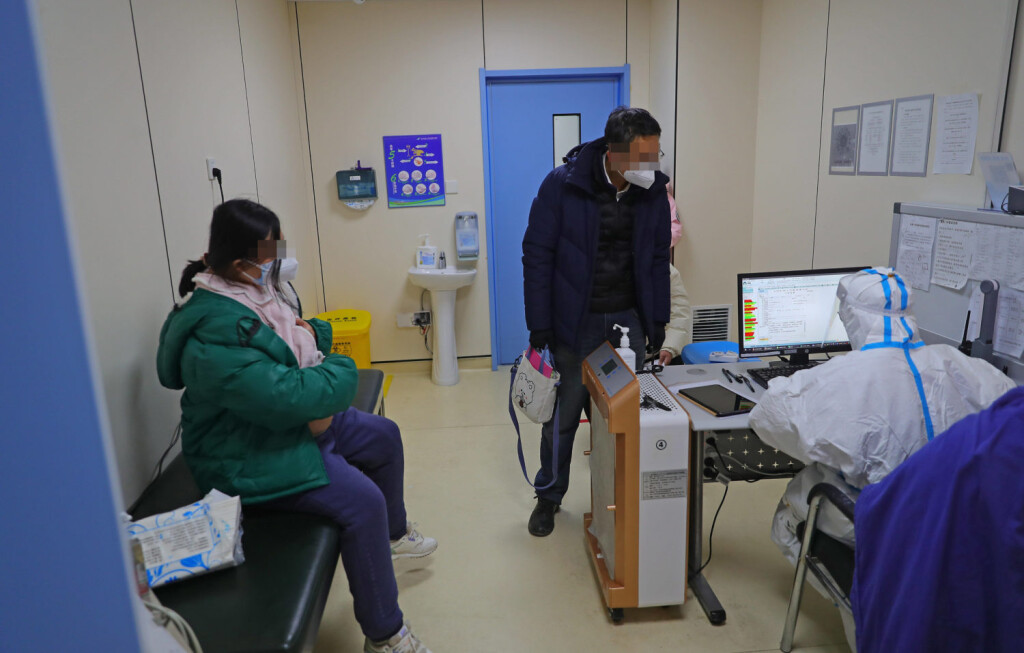 221217 -- SHENYANG, Dec. 17, 2022 -- A pregnant woman is seen at a fever clinic at Shengjing Hospital of China Medical University in Shenyang, northeast China s Liaoning Province, Dec. 15, 2022. China is continuing its optimization of COVID-19 epidemic prevention and control measures as it shifts the focus of its response strategy from curbing new infections to preventing and treating severe cases. The fever clinic of the hospital is trying its best to ensure the treatment of patients with acute and severe symptoms. CHINA-LIAONING-SHENYANG-FEVER CLINIC CN YangxQing PUBLICATIONxNOTxINxCHN