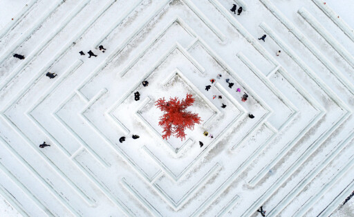 HOHHOT, CHINA - FEBRUARY 12: Aerial view of tourists walking in an ice palace maze during an ice and snow festival on February 12, 2023 in Hohhot, Inner Mongolia Autonomous Region of China. PUBLICATIONxINxGERxSUIxAUTxHUNxONLY Copyright: xVCGx VCG111422165139