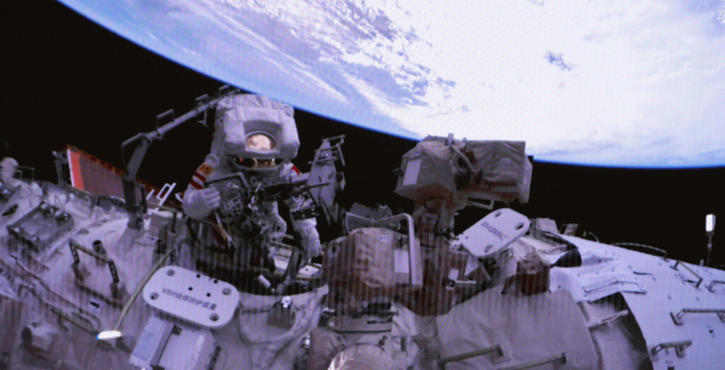 230210 -- BEIJING, Feb. 10, 2023 -- This screen image captured at Beijing Aerospace Control Center on Feb. 9, 2023 shows Shenzhou-15 taikonaut Fei Junlong conducting extravehicular activities EVAs out of the space station lab module Wentian. The Shenzhou-15 taikonauts on board the orbiting Chinese Tiangong space station completed their first spacewalk at 12:16 a.m. Beijing Time on Friday, according to the China Manned Space Agency. EyesonSciCHINA-SHENZHOU-15-TAIKONAUTS-EXTRAVEHICULAR ACTIVITIES-COMPLETION CN LiuxFang PUBLICATIONxNOTxINxCHN