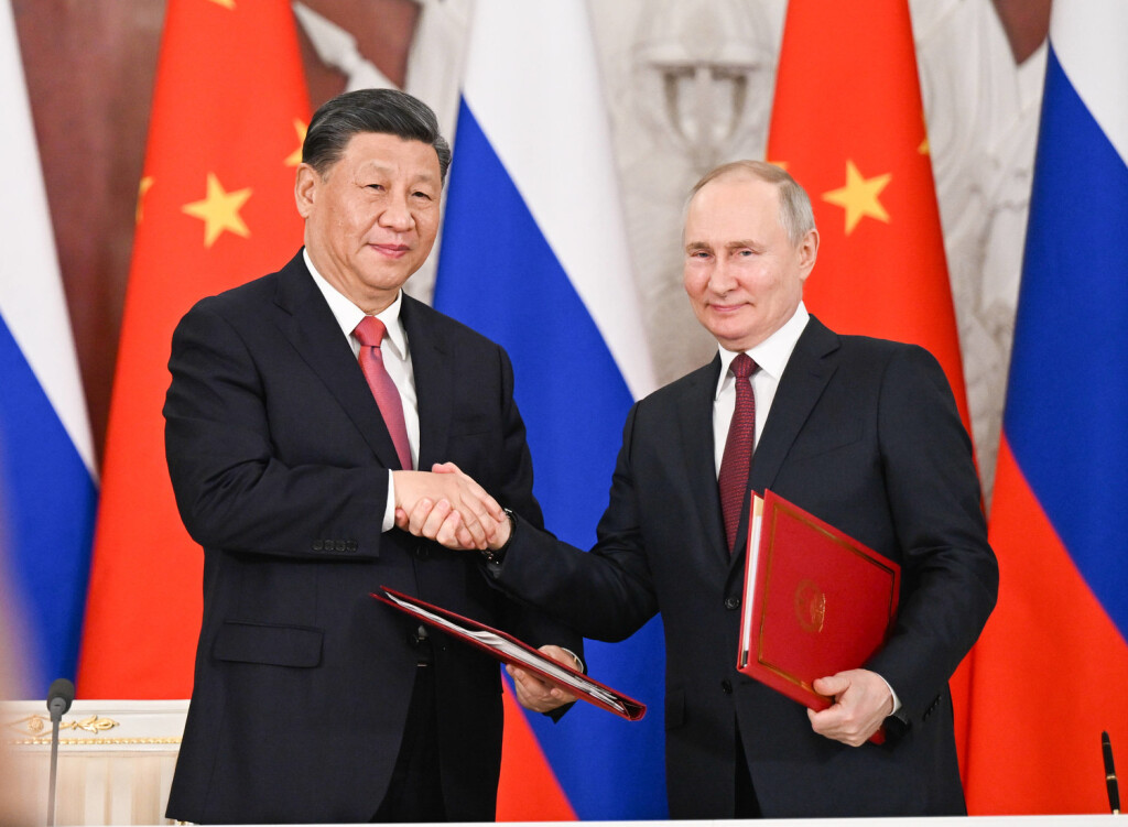 230321 -- MOSCOW, March 21, 2023 -- Chinese President Xi Jinping and Russian President Vladimir Putin shake hands after jointly signing a Joint Statement of the People s Republic of China and the Russian Federation on Deepening the Comprehensive Strategic Partnership of Coordination for the New Era and a Joint Statement of the President of the People s Republic of China and the President of the Russian Federation on Pre-2030 Development Plan on Priorities in China-Russia Economic Cooperation in Moscow, Russia, March 21, 2023. Xi on Tuesday held talks with Putin at the Kremlin in Moscow. RUSSIA-MOSCOW-CHINA-XI JINPING-PUTIN-TALKS XiexHuanchi PUBLICATIONxNOTxINxCHN