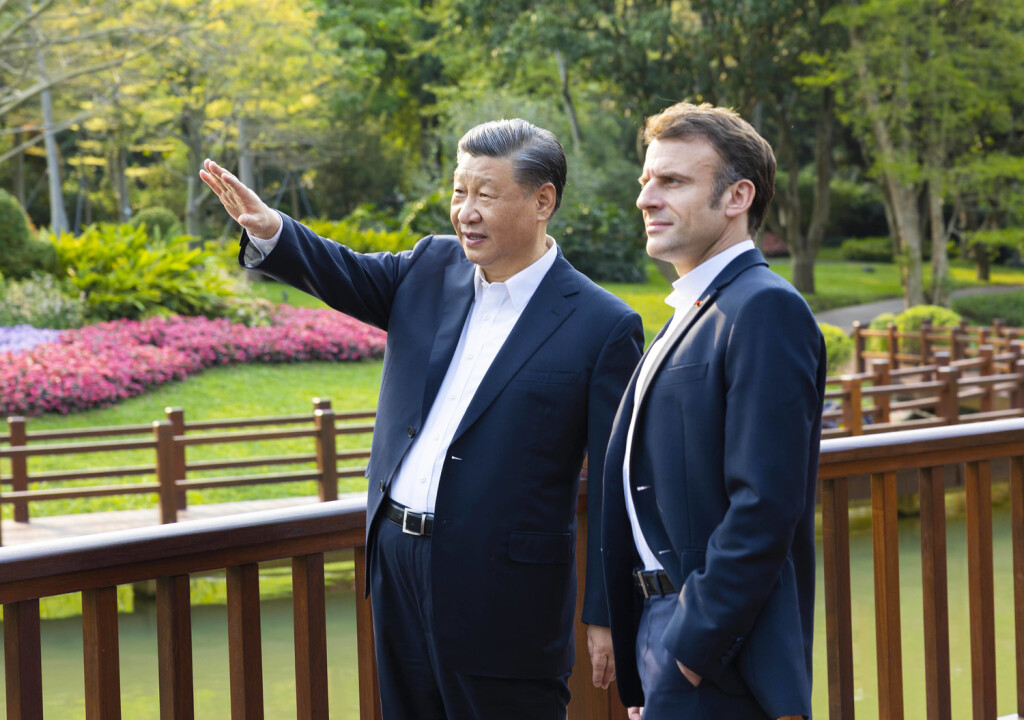 230407 -- GUANGZHOU, April 7, 2023 -- Chinese President Xi Jinping and French President Emmanuel Macron stroll through the Pine Garden, chatting and stopping at times to enjoy the unique scenery of the southern Chinese garden, in Guangzhou, south China s Guangdong Province, April 7, 2023. Xi held an informal meeting with Macron on Friday in Guangzhou, the capital of Guangdong Province in south China. CHINA-GUANGDONG-XI JINPING-FRENCH PRESIDENT-INFORMAL MEETING CN HuangxJingwen PUBLICATIONxNOTxINxCHN