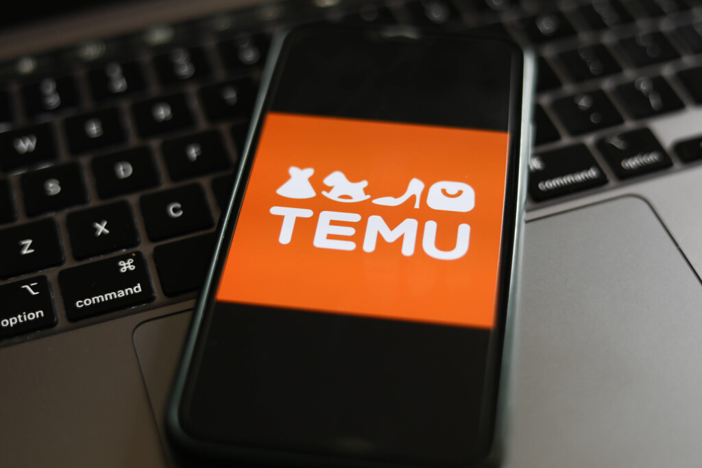 Temu Photo Illustrations A laptop keyboard and Temu logo displayed on a phone screen are seen in this illustration photo taken in Krakow, Poland on March 27, 2023. Krakow Poland PUBLICATIONxNOTxINxFRA Copyright: xJakubxPorzyckix originalFilename: porzycki-temuphot230327_npRiJ.jpg