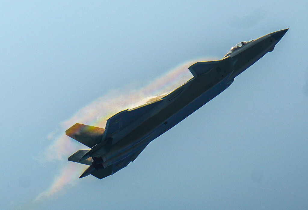 211003 -- ZHUHAI, Oct. 3, 2021 -- A J-20 stealth fighter jet performs aerobatics during the 13th China International Aviation and Aerospace Exhibition, or Airshow China 2021, in Zhuhai, south China s Guangdong Province, Sept. 28, 2021. Xinhua Headlines: Airshow China displays confidence, openness LiuxDawei PUBLICATIONxNOTxINxCHN