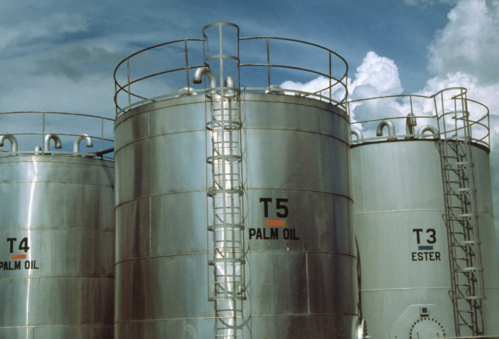 Palm oil storage tanks, Malaysia. Oil is extracted from the date_like seeds of the oil palm, SE Asia.