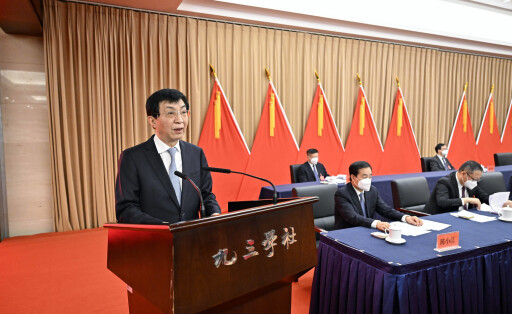 221220 -- BEIJING, Dec. 20, 2022 -- Wang Huning, a member of the Standing Committee of the Political Bureau of the Communist Party of China CPC Central Committee, attends the opening of the 12th national congress of China s Jiusan Society and delivers a congratulatory message on behalf of the CPC Central Committee, in Beijing, capital of China, Dec. 19, 2022. CHINA-BEIJING-JIUSAN SOCIETY-NATIONAL CONGRESS-WANG HUNING CN YinxBogu PUBLICATIONxNOTxINxCHN