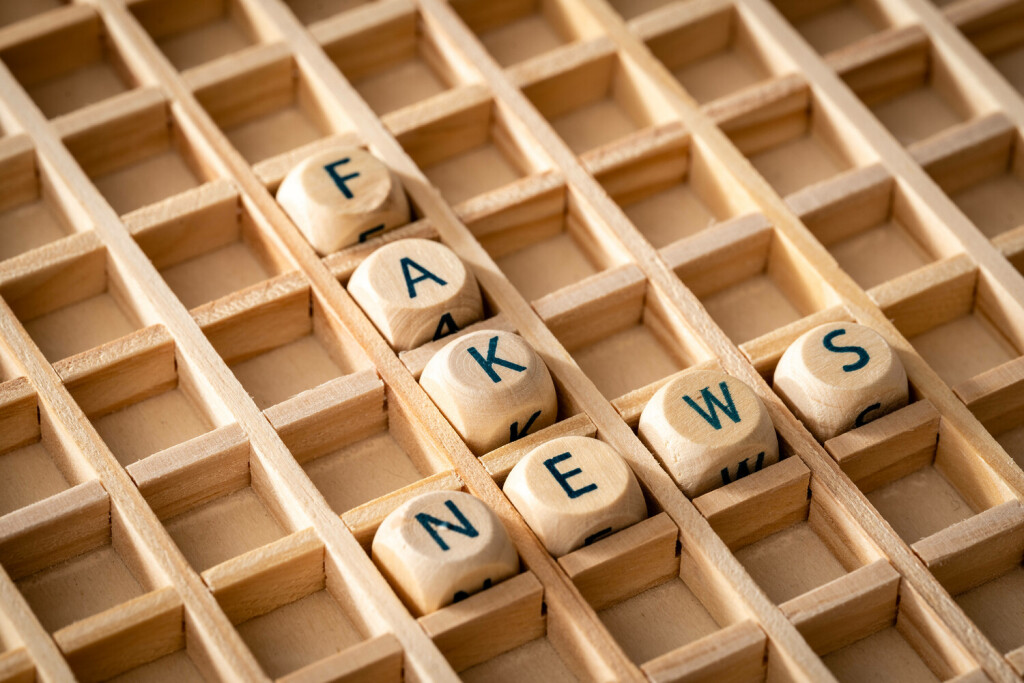 7 March 2023: Wooden cube with the inscription: Fake and News. Symbol image Fakenews *** Holzwürfel mit der Aufschrift: Fake und News. Symbolbild Fakenews
