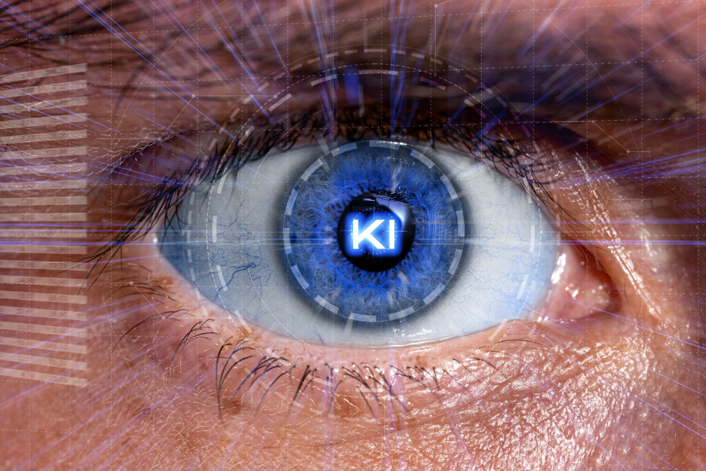 6 August 2023: Close-up of an eyeball in which the inscription AI (Artificial Intelligence) is glowing. People eye with