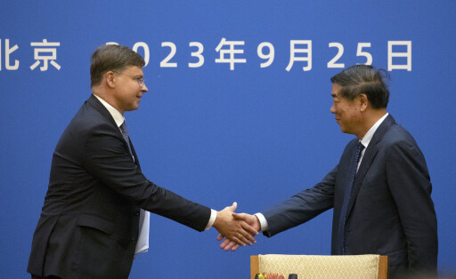 epa10882608 European Commission Executive Vice-President and Commissioner for Economy and Trade, Valdis Dombrovskis (L) and Vice-Premier of China He Lifeng shake hands after a press conference following the 10th EU-China High-Level Economic and Trade Dialogue (HED) in Beijing, China, 25 September 2023. EPA-EFE/ANDRES MARTINEZ CASARES