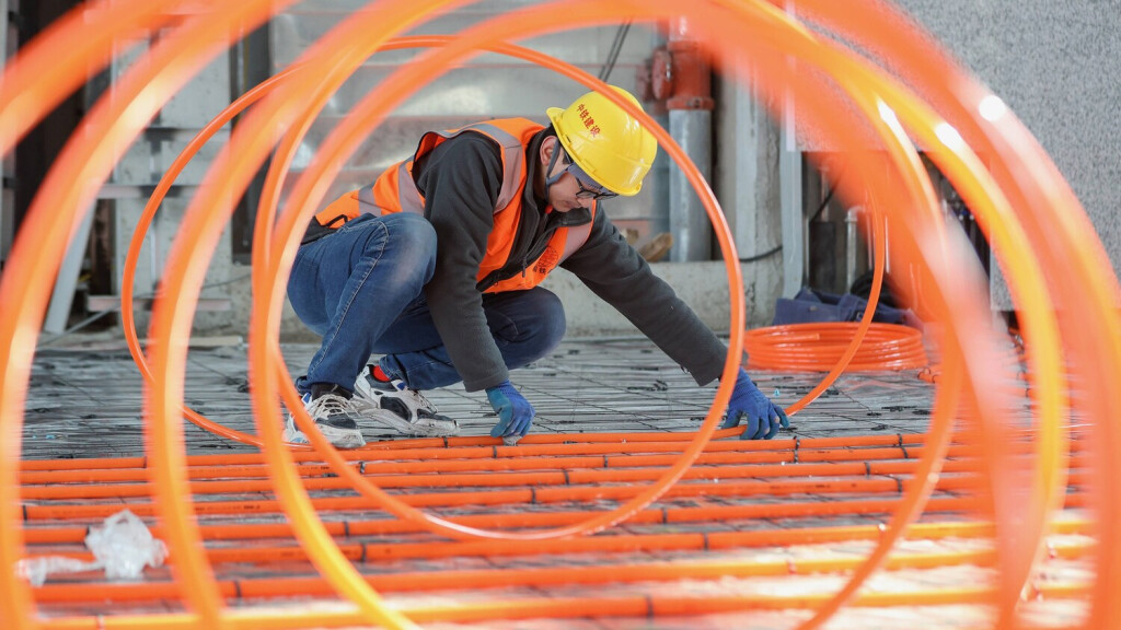 LANGFANG, CHINA - FEBRUARY 22: A worker lays pipes at the construction site of Yongqing East Railway Station on the Tianjin-Daxing Airport Railway connecting Tianjin West station with Beijing Daxing International Airport on February 22, 2023 in Langfang, Hebei Province of China. PUBLICATIONxINxGERxSUIxAUTxHUNxONLY Copyright: xChinaxNewsxServicex VCG111423822603
