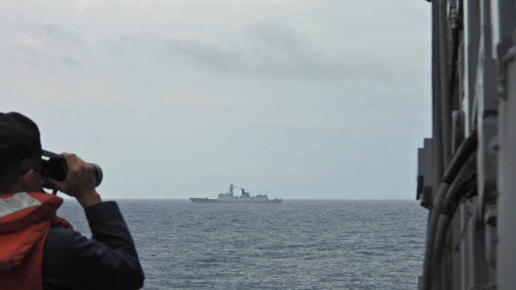 August 19, 2023, Taipei, Taipei City, Taiwan: In this handout provided by the TAIWAN DEFENSE MINISTRY, a Taiwanese naval soldier on board Tian Dan frigate is seen monitoring Chinese frigate Xuzhou using a binocular, as Chinese PLA conducts military exercises around the self-governing island. China s military launched joint air and sea patrols around Taiwan this weekend following the conclusion of a summit between leaders from the United States, Japan and South Korea to shore up alliance, amid Beijing s increasing military presence in the region. Taipei Taiwan - ZUMAh165 20230819_zih_h165_003 Copyright: xROCx