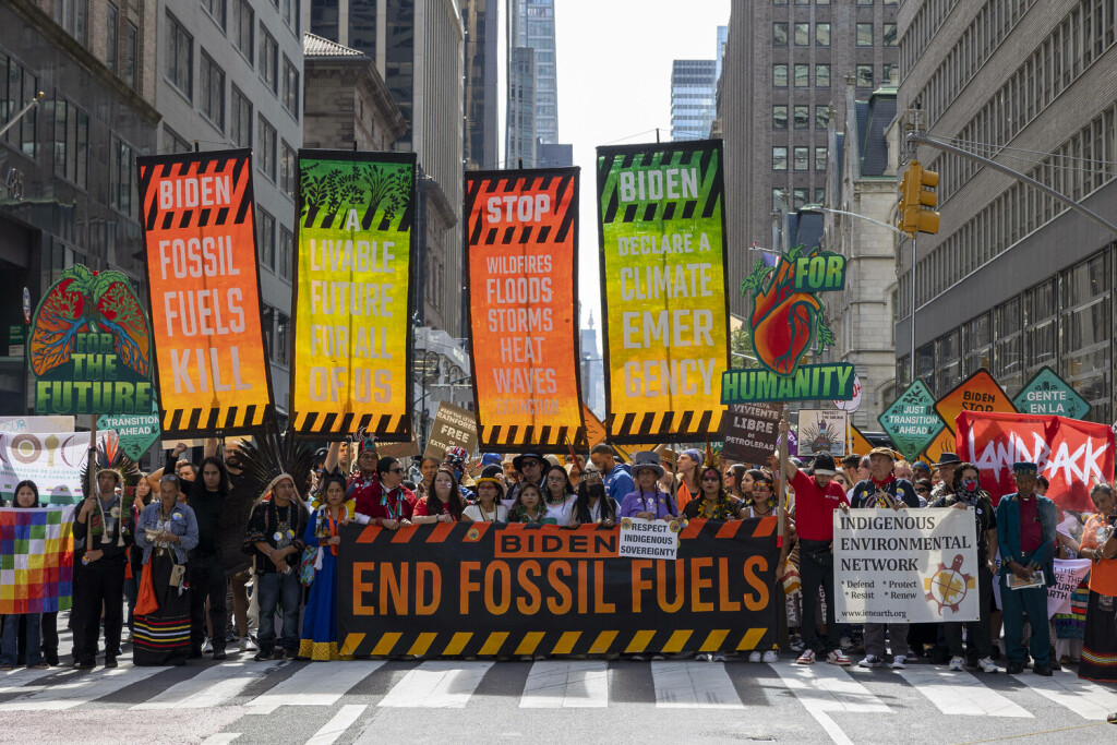 September 17, 2023, New York, New York, USA: Banners read Biden End Fossil Fuels Biden Fossil Fuels Kill Stop wildfires floods storms heatwaves Biden Declare a climate emergency A livable future for all of us For Humanity Landback Indigenous Environmental Network Led by Indigenous communities an estimated 75,000 people march through midtown Manhattan to the United Nations calling for President Biden to end to fossil fuels. The march precedes the upcoming UN Climate Ambition Summit. New York USA - ZUMAr174 20230917_znp_r174_151 Copyright: xGinaxMxRandazzox