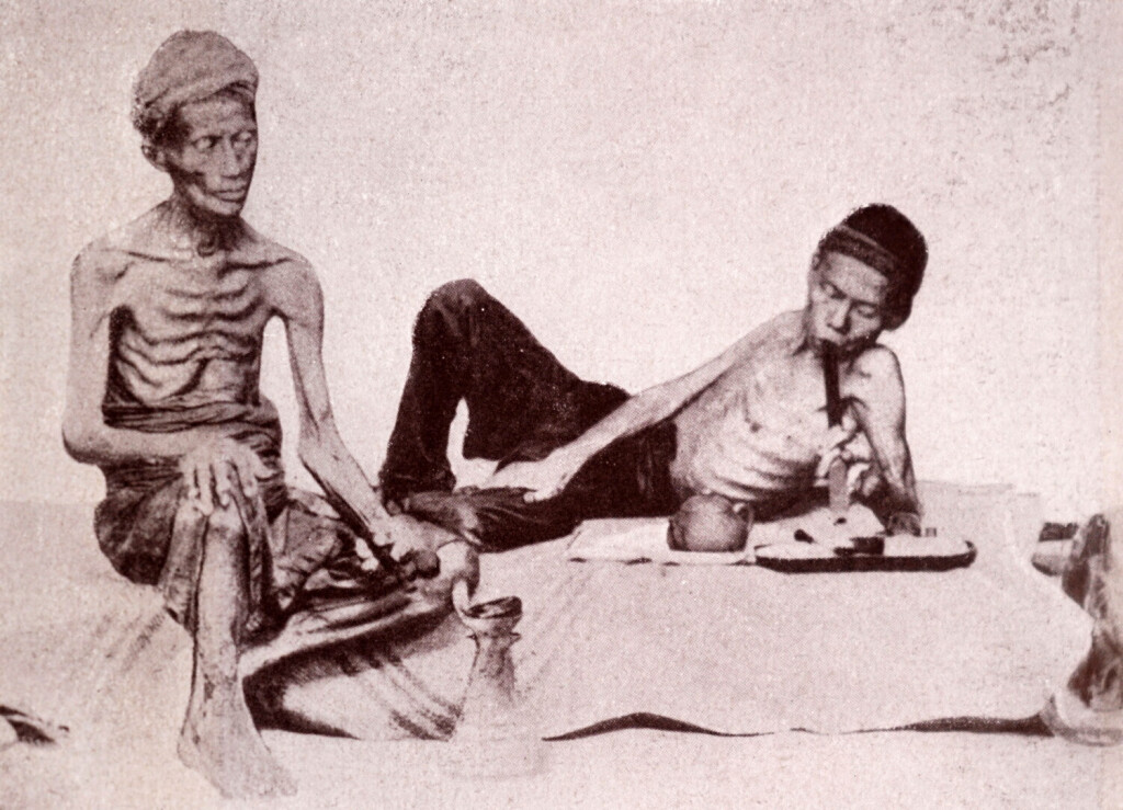 RECORD DATE NOT STATED The Anglo-Chinese War, also known as the Opium War or the First Opium War, was a series of military engagements fought between Britain and the Qing dynasty between 1839 and 1842. Black and white photograph of two under-nourished Chinese men WorldxHistoryxArchive 917_05_wha_166_0871