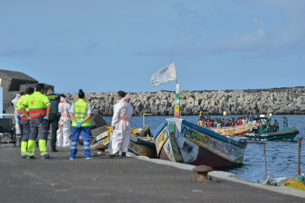 Two Canoes With 327 Migrants Arrive At El Hierro Island - Spain A Guardia Civil boat transfers one of the cayucos that h